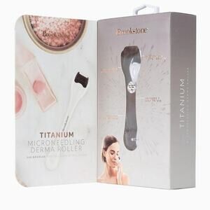 BROOKSTONE CORDLESS TITANIUM MICRO NEEDLE DERMA ROLLER NEW!